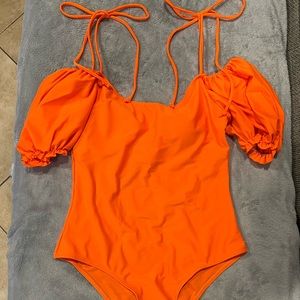 Orange one piece swim suit